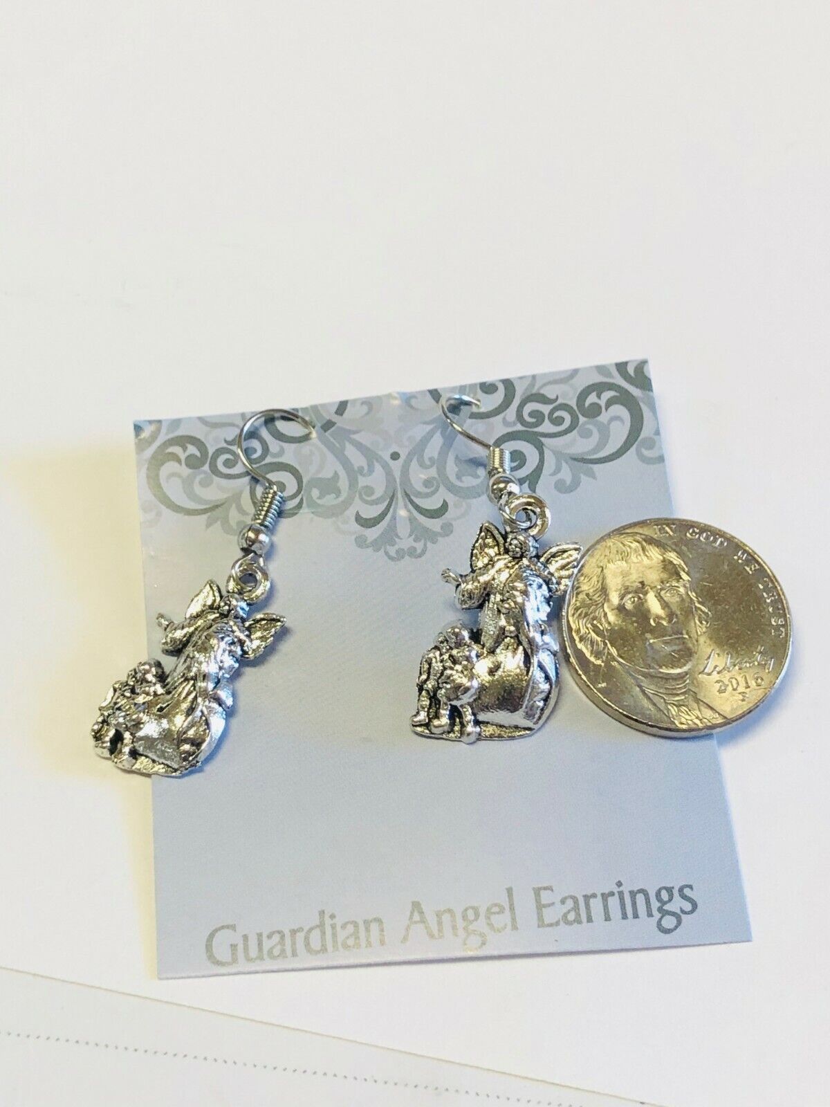 Guardian Angel Earrings, Silvertone, New - Bob and Penny Lord